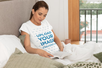 T-Shirt Mockup Featuring a Middle-Aged Woman Reading in Bed