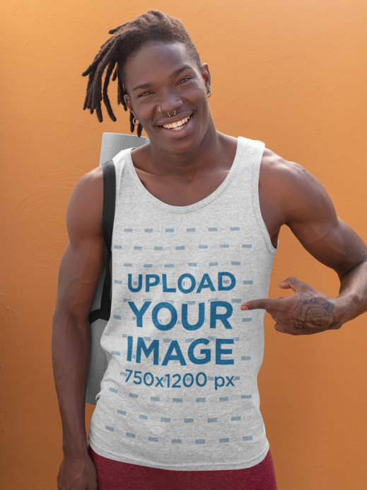 Tank Top Mockup of a Happy Man With a Hand Tattoo and Ready for a Yoga Class 