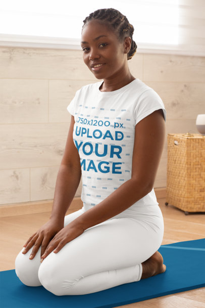 T-Shirt Mockup of a Kneeled Woman Doing Yoga