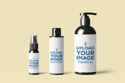 Mockup of Three Plastic Bottles in Different Sizes Against a Plain Background