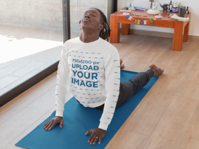 Mockup of a Man Wearing a Long Sleeve Tee With Customizable Sleeves Doing Yoga 