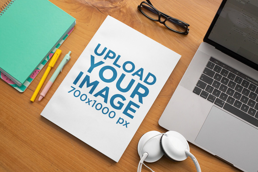 Mockup of a Magazine Placed on a Wooden Desktop