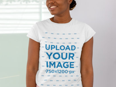 T-Shirt Mockup of a Smiling Woman at a Yoga Studio