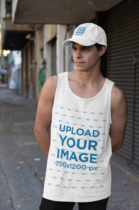 Mockup of a Young Serious Man Wearing a Dad Hat and a Heather Tank Top