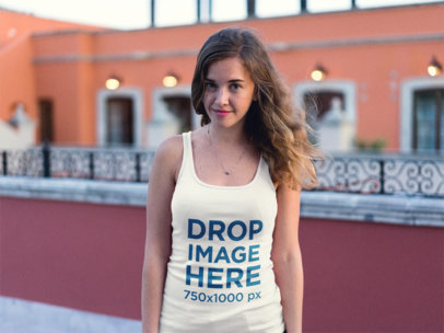 Trendy Woman Wearing a Tank Top Mockup on a Colorful Rooftop