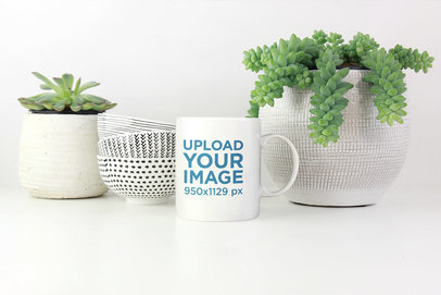 Coffee Mug Mockup Placed Between Some Decoration Plants 