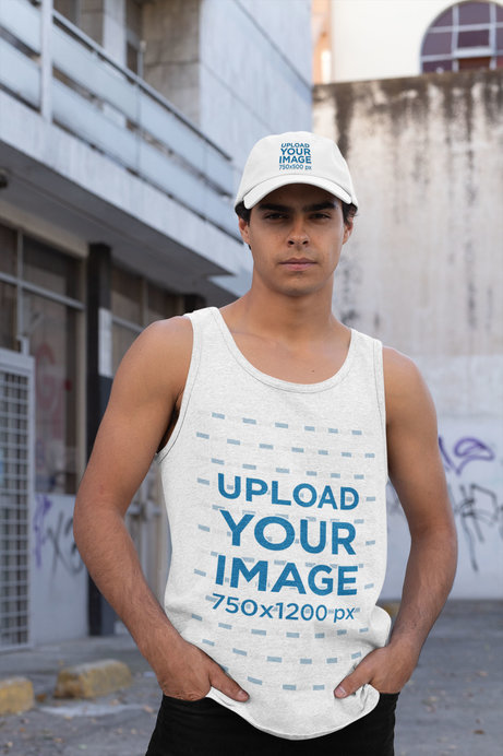 Tank Top and Dad Hat Mockup Featuring a Young Man in an Urban Scenario