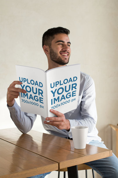 Mockup of a Man Reading a Magazine