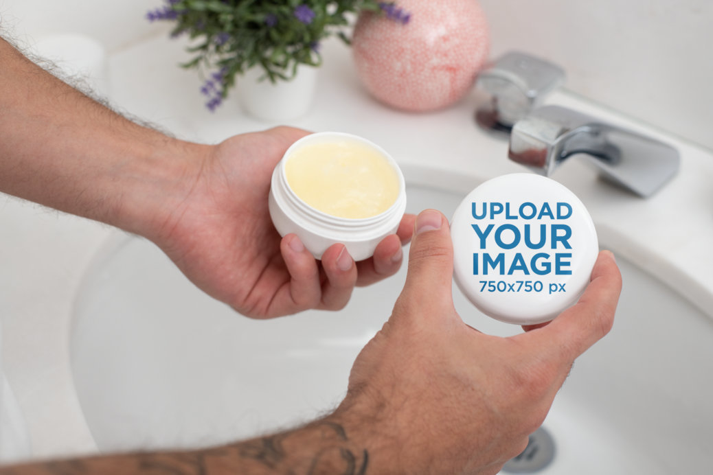 2 oz CBD Jar Mockup Featuring a Man in a Bathroom Sink