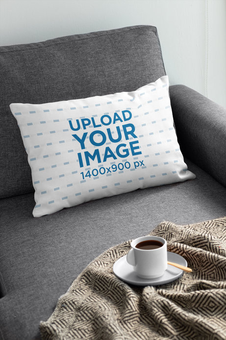 Pillow Mockup Featuring a Cup of Coffee on a Sofa