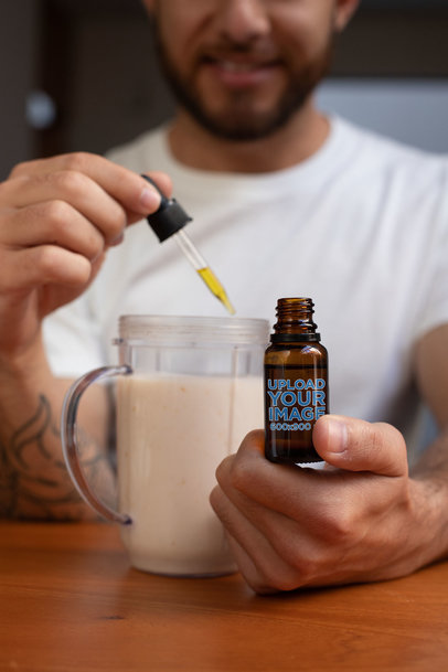 Mockup of a Bearded Man Using a Dropper
