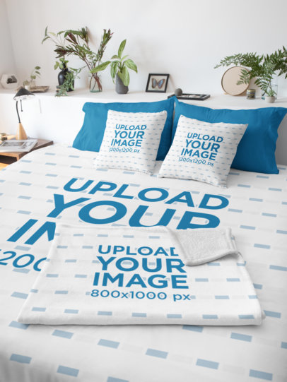 Duvet Cover Mockup Featuring a Fleece Blanket and Two Pillows