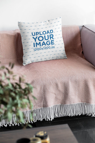 Mockup of a Squared Pillow on a Relaxing Couch