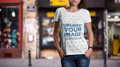 Mockup of a Young Woman Wearing a T-Shirt on the Street