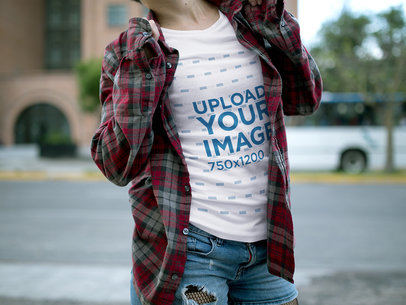 T-Shirt Mockup of a Woman Wearing a Plaid Shirt