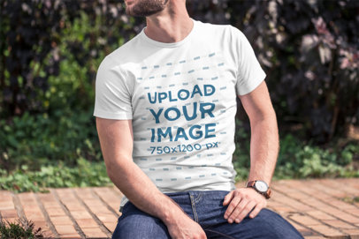 T-Shirt Mockup Featuring a Man on a Sunny Day