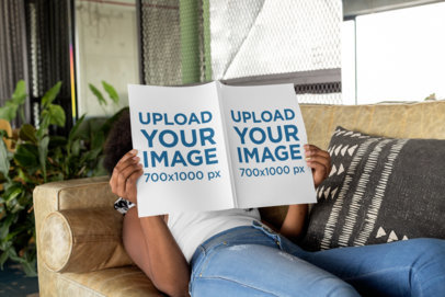 Magazine Mockup Featuring a Woman Lying on a Couch 31566