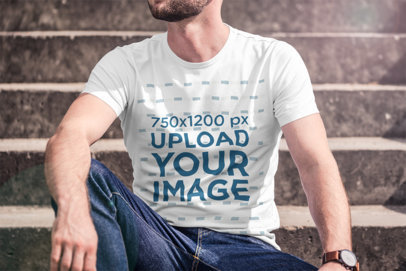 T-Shirt Mockup of a Bearded Man Sitting on Some Steps