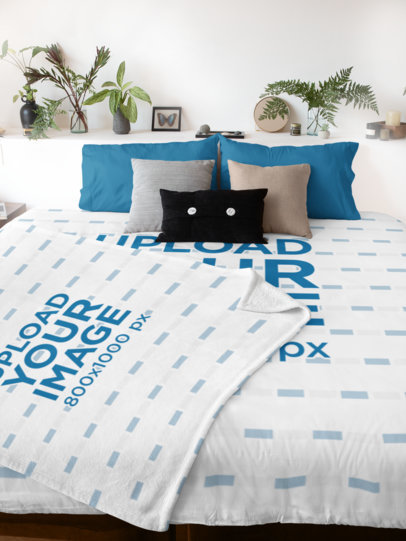 Mockup Featuring a Duvet Cover and a Fleece Blanket on a Bed 