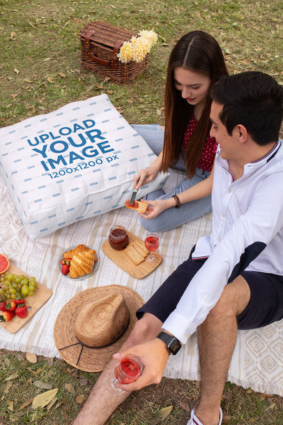 Cushion Mockup of a Young Couple Having a Picnic 