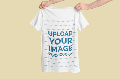 Mockup of Someone Holding a T-Shirt Against a Customizable Background