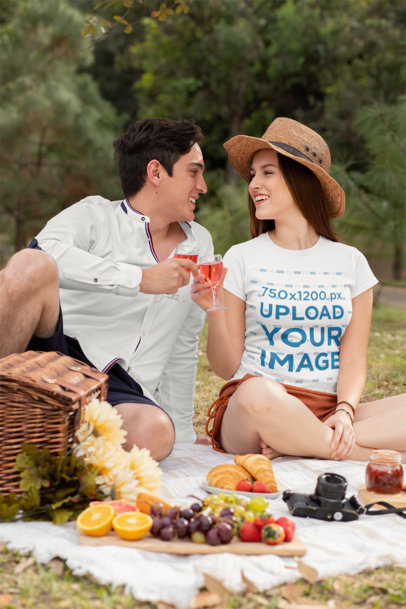T-Shirt Mockup Featuring a Happy Couple Having a Picnic at the Park 