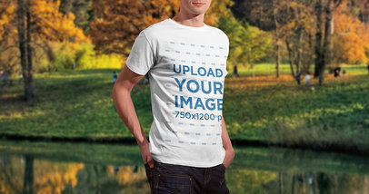 Mockup of a Man Wearing a T-Shirt Next to a Lagoon