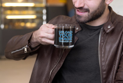 11 oz Clear Coffee Mug Mockup Featuring a Bearded Man Taking a Sip
