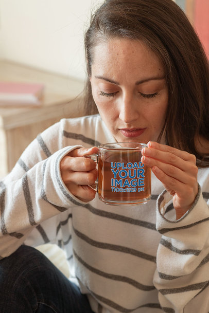 11 oz Glass Mug Mockup of a Woman Enjoying Her Tea