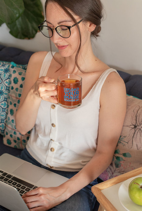 11 oz Glass Mug Mockup of a Woman Working From Home