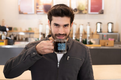Clear Mug Mockup of a Bearded Man Tasting a Dark Coffee