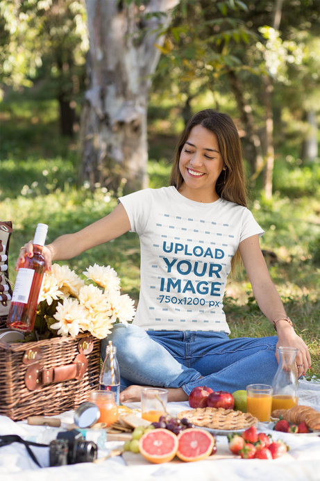T-Shirt Mockup Featuring a Woman on a Picnic