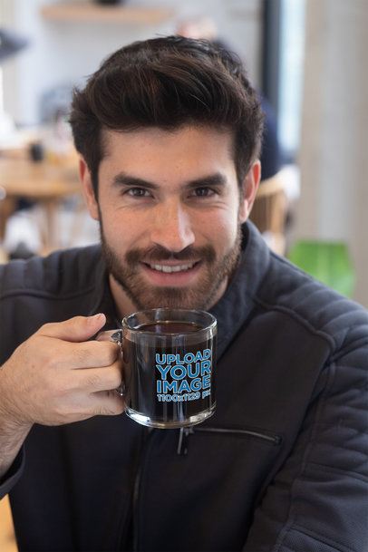 Clear Glass Mug Mockup Featuring a Bearded Man Drinking Coffee 