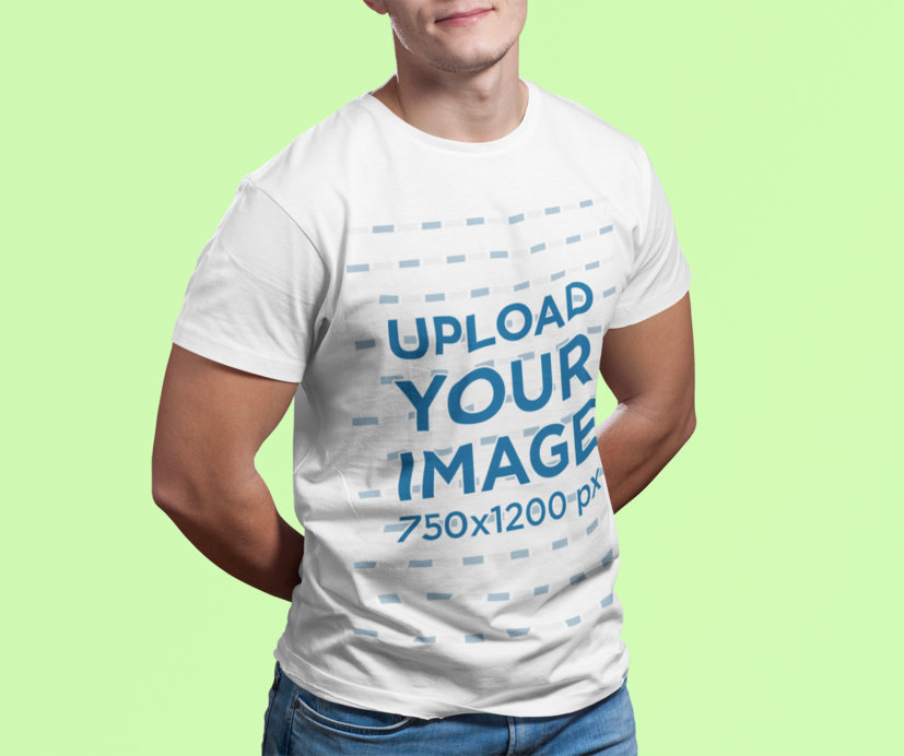 T-Shirt Mockup Featuring a Muscled Man in a Studio