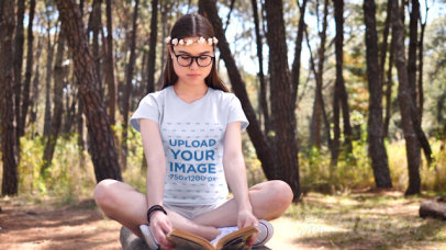 T-Shirt Video of a Woman Reading in the Woods