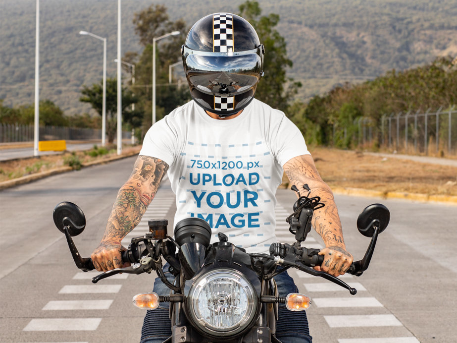 T-Shirt Mockup of a Tattooed Man Riding His Motorcycle