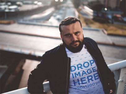 Plus Size T-Shirt Mockup Featuring a Hispanic Man 