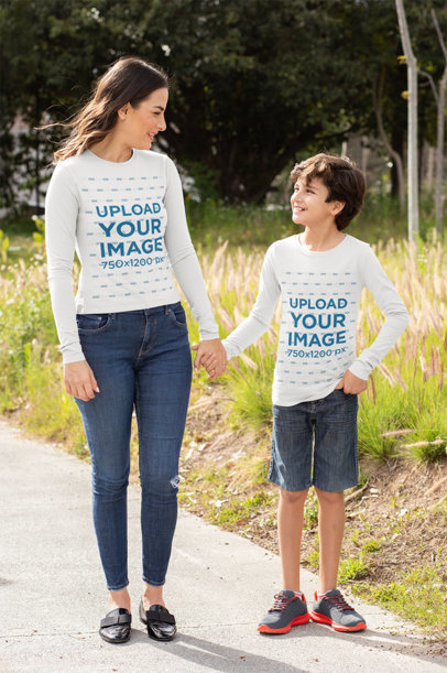 Long-Sleeve Tee Mockup Featuring a Family of Two Holding Hands at the Park 