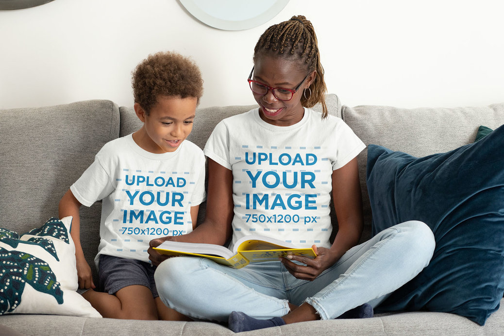 T-Shirt Mockup Featuring a Mom and Her Son Reading Together at Home 