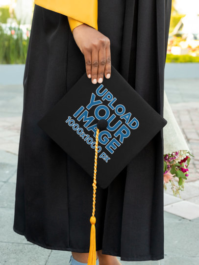 Mockup of a Woman Holding a Graduation Cap