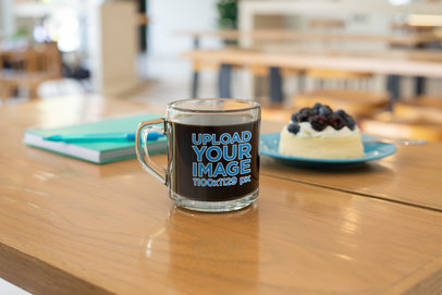 Mockup of an 11 oz Clear Glass Mug Placed on a Table