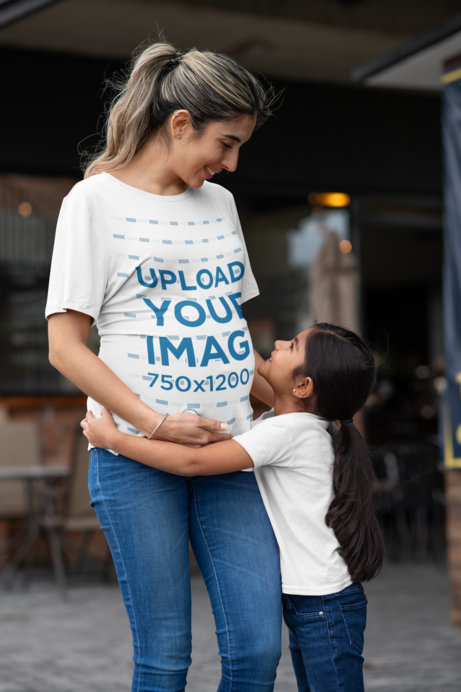 T-Shirt Mockup Featuring a Little Girl Hugging Her Mother 
