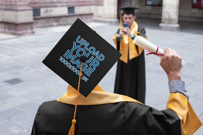 Graduation Cap Mockup Featuring a Man Taking a Picture of His Friend 