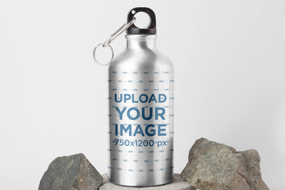 Aluminum Bottle Mockup Featuring Some Rocks
