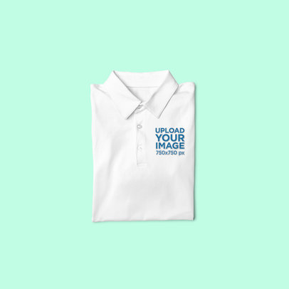 Mockup of a Folded Polo Shirt Lying Flat on a Plain Surface