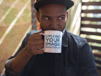 Mug Mockup of a Young Man Drinking a Hot Beverage