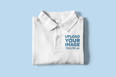 Mockup of a Folded Polo Shirt Placed on a Customizable Surface