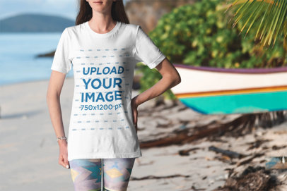 T-Shirt Mockup of a Woman Standing Near a Panga Boat by the Beach 