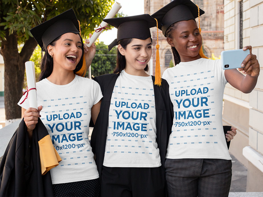 T-Shirt Mockup Featuring Three Smiling Friends at Their Graduation Day