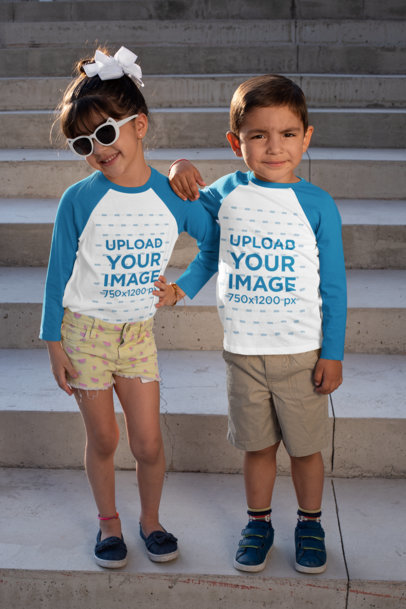 Mockup of Two Little Kids Posing with Raglan T-Shirts